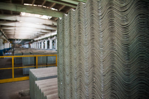 istock Asbestos cement roofing sheets, corrugated panels, stacked 1217013414