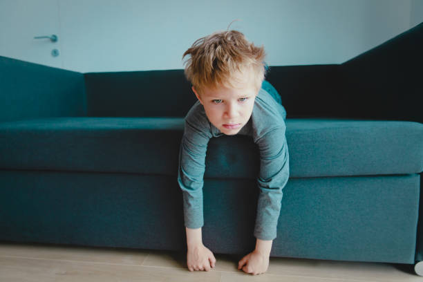 istock sad and stressed kid, tired and exhausted child at home 1217016866