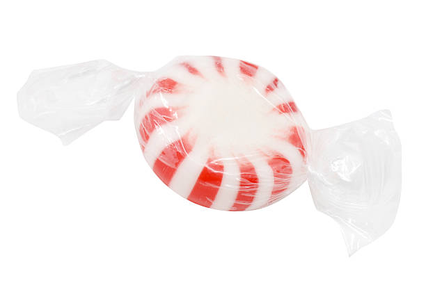 Peppermint Candy in Plastic Wrapper Isolated | Hard Candies  peppermints stock pictures, royalty-free photos & images