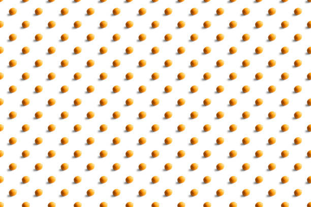 istock Dried lemon pattern on a white background. Food texture. Seamless texture of lemon. 1217020079