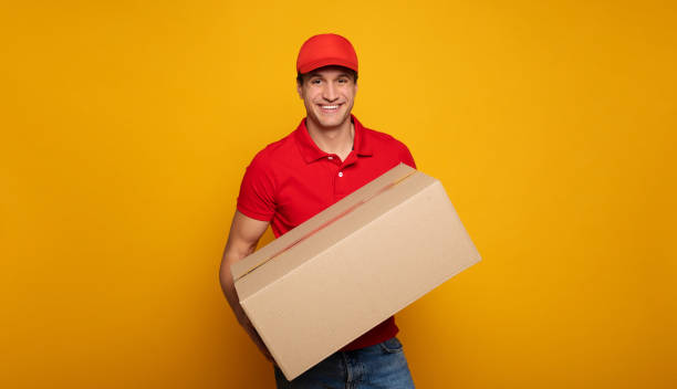 istock Courier or delivery man. Service for people 1217020269