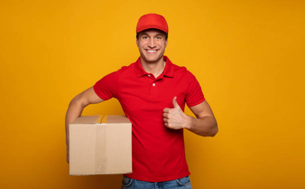 istock Courier or delivery man. Service for people 1217020288