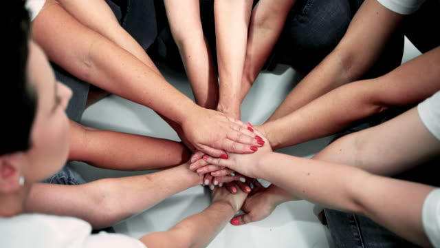 Hands together for unity and share success