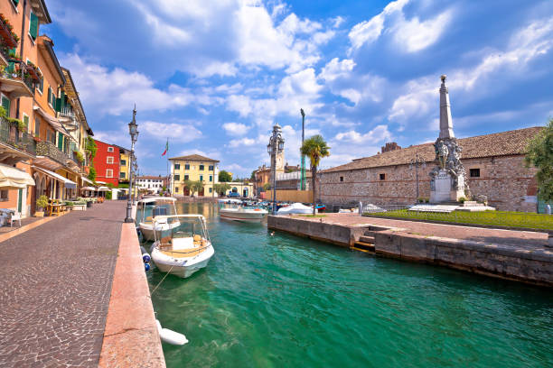 istock Lazise turquoise harbor and waterfront view, Lago di Garda 1217021790