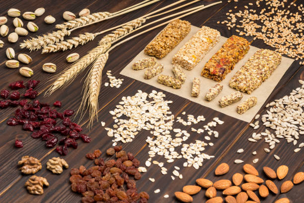 istock Spikelets of wheat, Nuts, seeds, cereals. Balanced protein granola bar. 1217021810