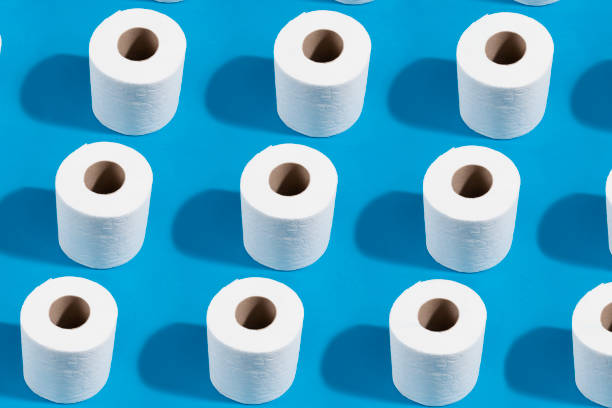istock White Toilet Paper on Blue Background 1217023522