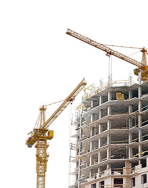 istock unfinished brick house and two cranes 121702365
