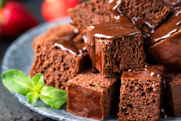 istock Dark chocolate cake cut in squares 1217024967