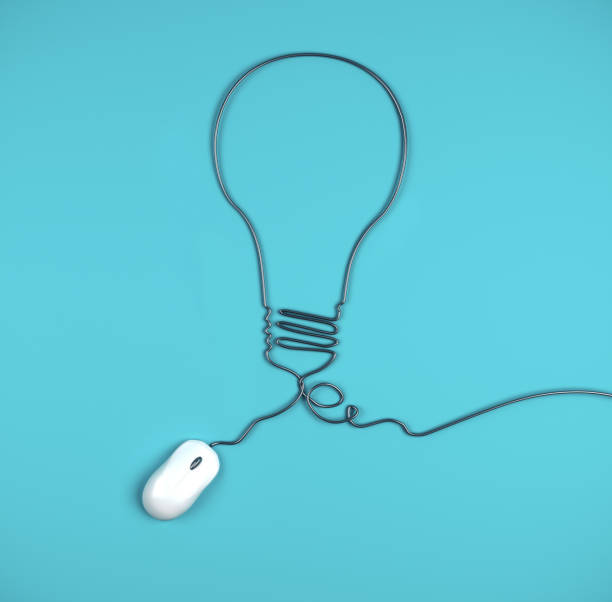 istock Computer mouse and cables in form of lamp 1217025202