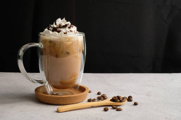 istock Coffee cup and beans top view with copyspace . flat lay latte for menu, background, banner and advertisement. brew caffeine drink and modern style. 1217027391