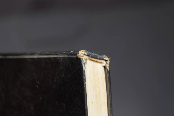 binding of an old book in black cover.