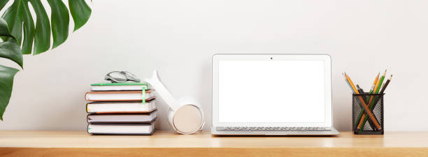 istock Stylish home studio workspace with computer, supplies and headphones 1217029064