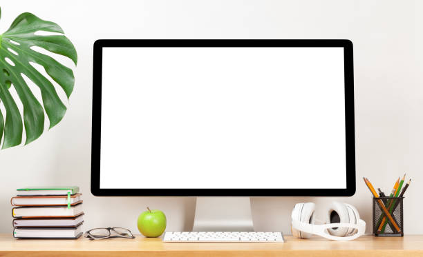 istock Stylish home studio workspace with computer, supplies and headphones 1217029080