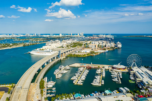 Beautiful aerial panoramic view of the city of Miami, its buildings, marina, yachts and luxurious suburbs houses