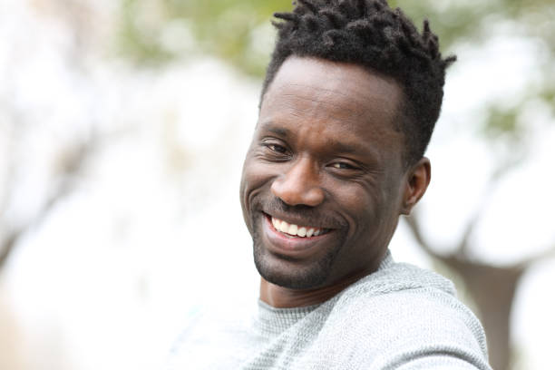istock Happy black man with perfect smile looking at camera 1217031524