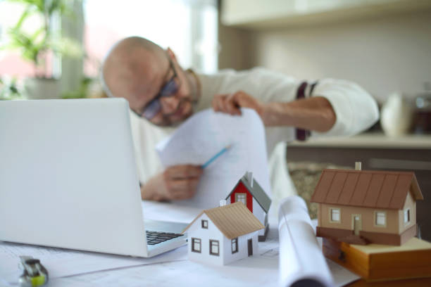 istock Mature adult man working at home 1217031648