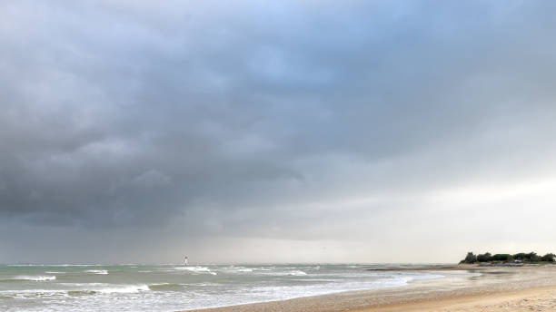 istock the lighthouse and the storm 1217033864