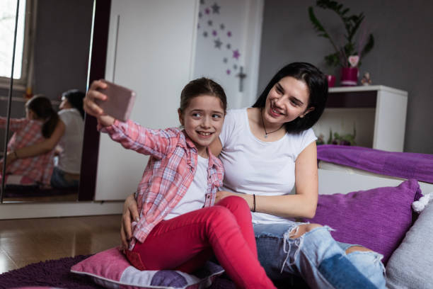 istock Jolly girls taking selfie 1217035356