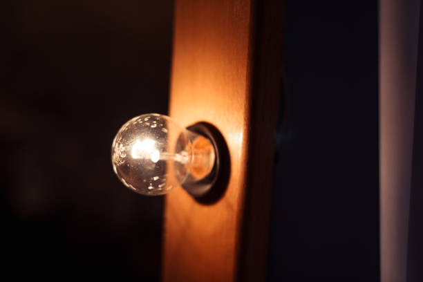 istock dirty lamp glow on a new brown board 1217036445
