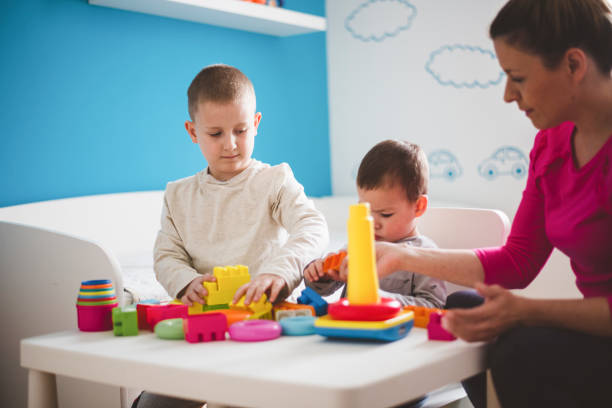 istock Family playing with plastic toys 1217038679