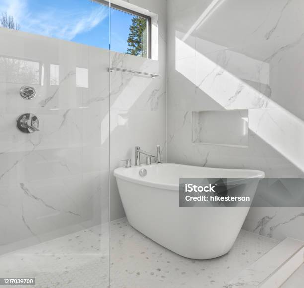 Beautiful Bathroom Interior In New Luxury Home With Large Walkin Shower And Free Standing Bathtub Stock Photo - Download Image Now