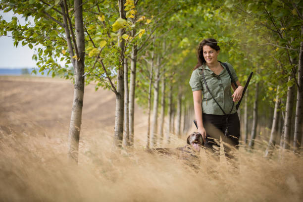 istock Woman hunter in the woods 1217040285