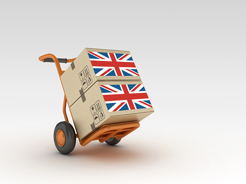 Hand Truck and Cardboard Boxes with UK Flag - 3D Rendering