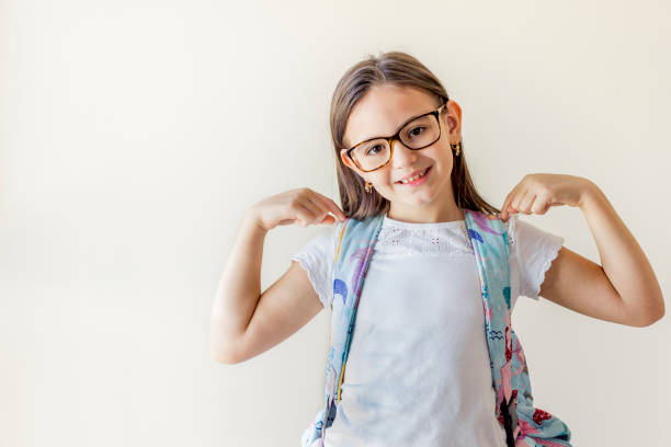 Young beautiful smart student girl wearing backpack over isolated background looking confident with smile on face, pointing oneself with fingers proud and happy Young beautiful smart student girl wearing backpack over isolated background looking confident with smile on face, pointing oneself with fingers proud and happy animal finger stock pictures, royalty-free photos & images