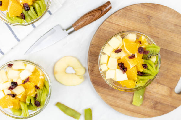 istock Fruit salad with kiwi orange and apple in the bowl 1217051726