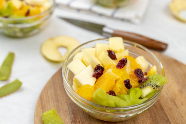 istock Fruit salad whipped cream flat lay white marble table 1217051763