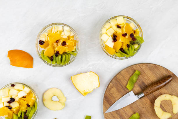 istock Fruit salad with kiwi orange and apple in the bowl 1217051825