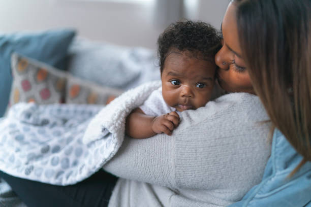 istock Kisses for baby 1217055950