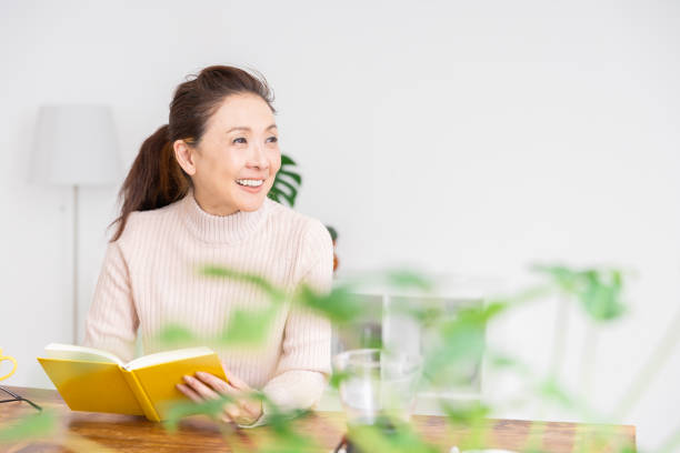 istock woman who reads a book 1217058321