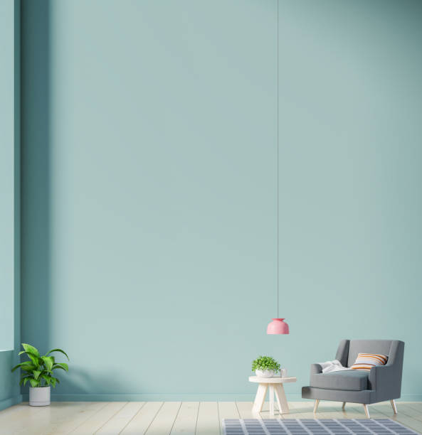 istock The interior has a armchair on empty green wall background. 1217059145