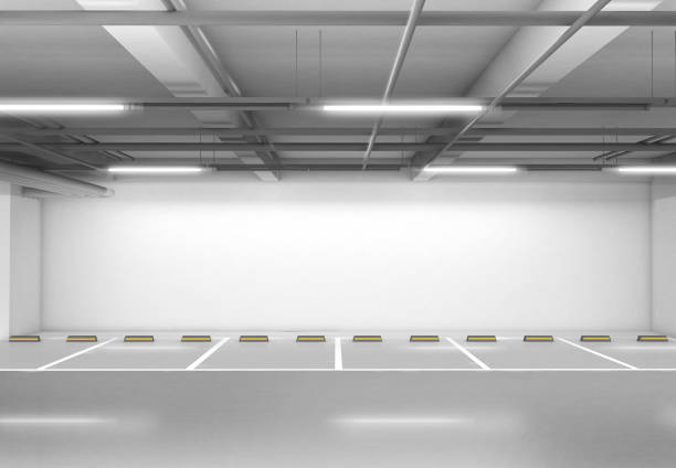 istock parking lot background. 3d render of car park with empty wall, wall graphic background. 1217060815
