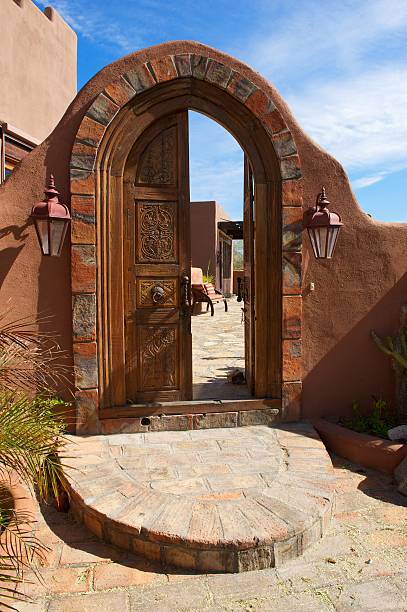 istock Large Arched Ornate Double Door with Brick 121706611