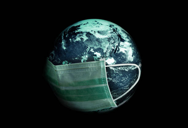 istock save the earth wearing medical mask to protect pandamic 1217067407