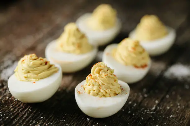 A horizontal image of deviled eggs  photographed diagonally