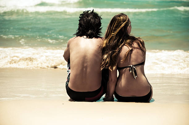 istock Young couple by the sea 121707070