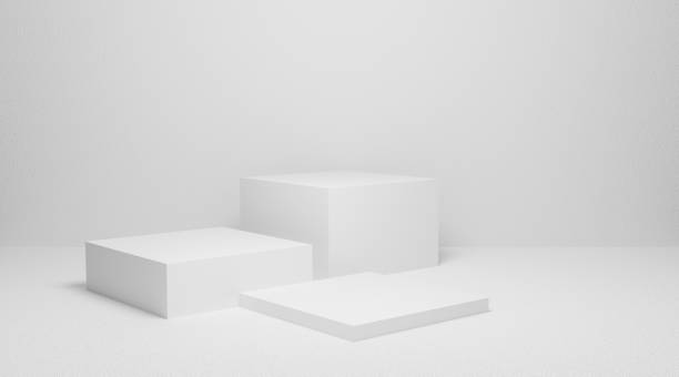 istock 3d exhibition stand. White blank empty podium isolated on gray background for presentation and exposition. Pedestal for display product. Interior stage design. Abstract 3d podium for mock up store. 1217072089