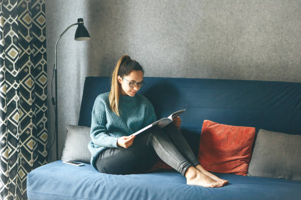Girl reading a magazine