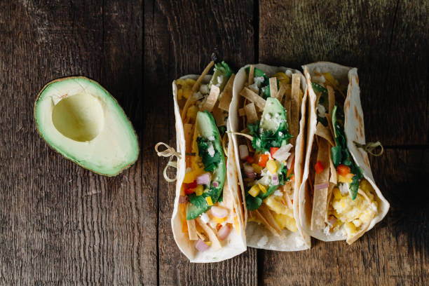 istock Breakfast tacos with eggs, avocado and fresh cut vegetables 1217079335