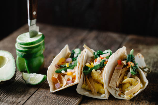 istock Breakfast tacos with eggs, avocado and fresh cut vegetables 1217079352