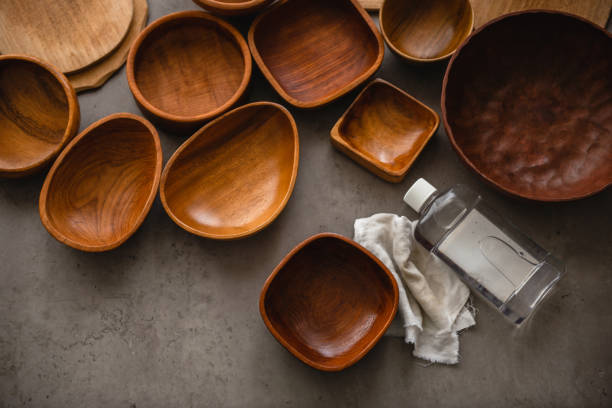 istock Polished wooden Bowls on Grey Background 1217082149
