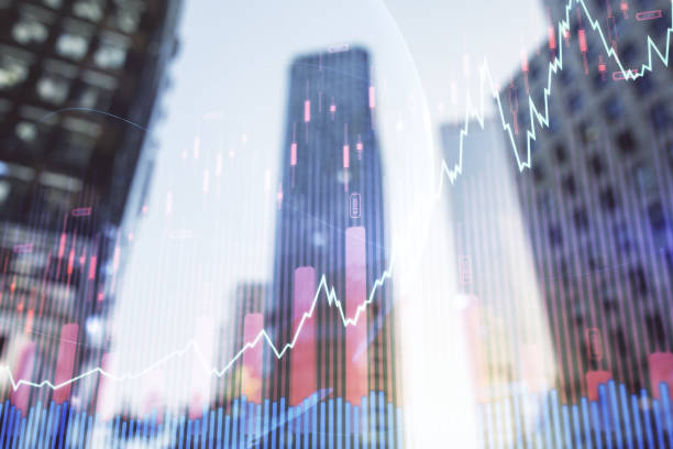 istock Double exposure of abstract financial graph with world map on office buildings background, financial and trading concept 1217082972
