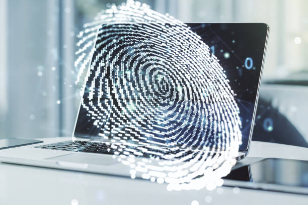 istock Abstract creative fingerprint concept on modern laptop background. Multiexposure 1217083587