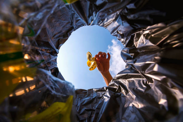Banana peel was thrown into the garbage bag for disposal. Look from the inside of the basket. Banana peel was thrown into the garbage bag for disposal. Look from the inside of the basket. scene scented stock pictures, royalty-free photos & images