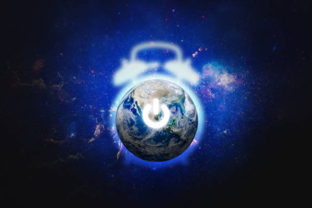 istock Blue planet earth in the space with electric power button for Earth Hour Event. 1217084020