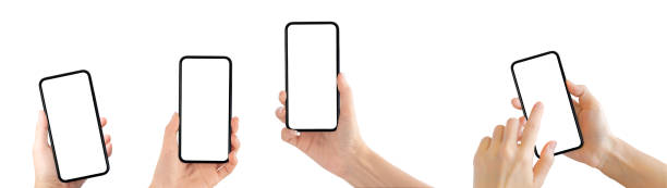 istock Hand holding old black smartphone isolated on white background. 1217085045