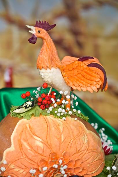 istock A rooster carved from a pumpkin 1217085162